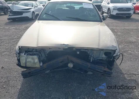 1999 Ford Crown Victoria Lx z USA, uszkodzony, nr VIN 2FAFP74W4XX127400